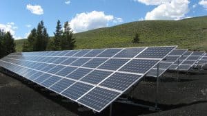 solar panels installed in a field in Colorado, supported by a tax credit