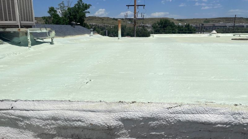a GACO roof coating newly installed on a commercial roof