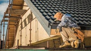 Best Roofing Contractors in Denver on a roof.