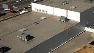 An image of a roof that needs a commercial roof replacement in Denver