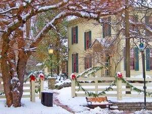 house with snowy sidewalk